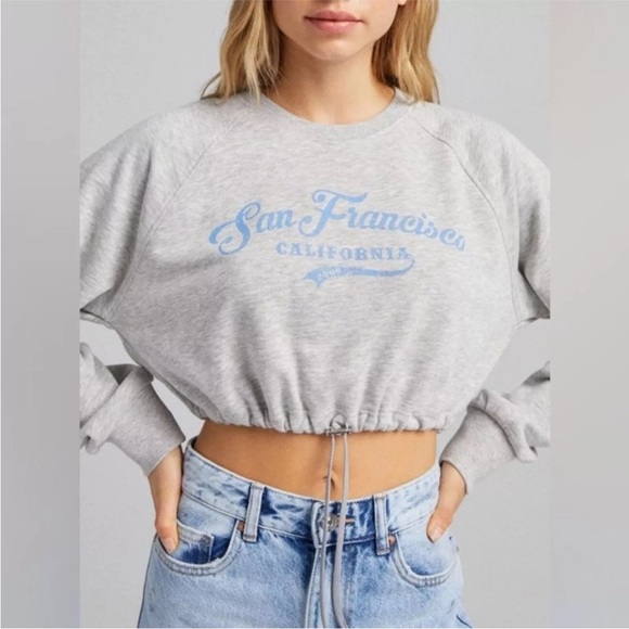 Bershka Womens Grey Cropped Sweatshirt with Stopper Drawstring Waist "SF Cali" L - Picture 1 of 12